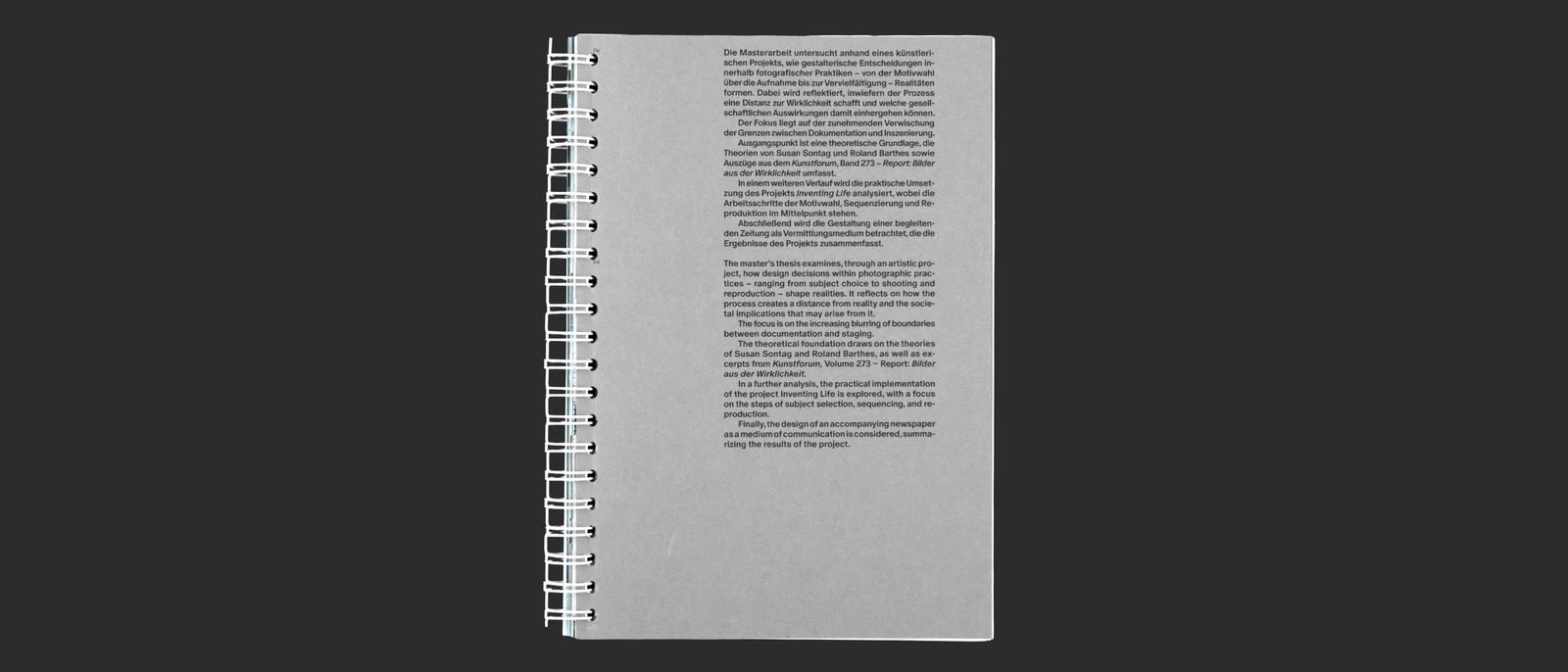 Back cover of the grey spiral-bound thesis with a block of text.